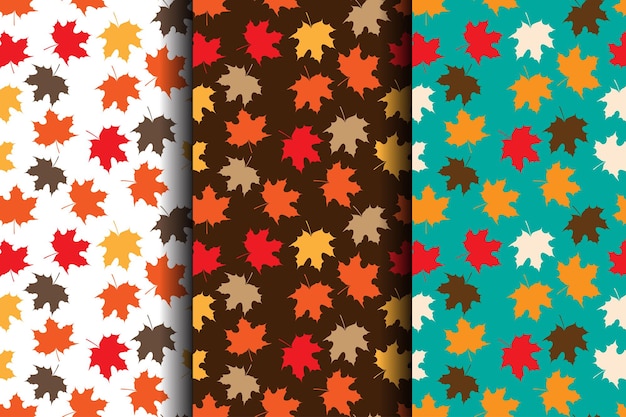 Set of autumn seamless patterns with red yellow and orange leaves