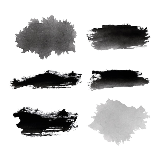 A set of black paint brushes with a white background.