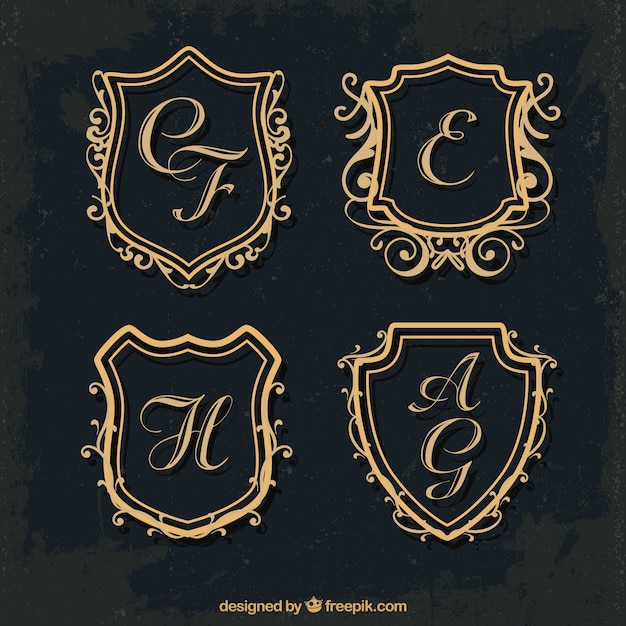 Set di monogrammi di scudo d'oro