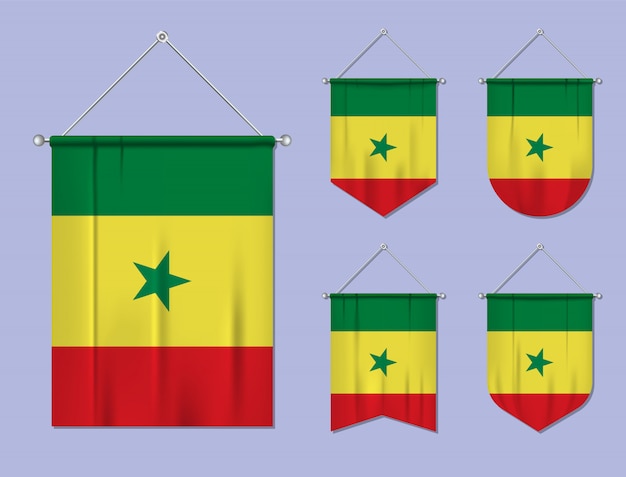 Set hangende vlaggen senegal met textiel patroon. diversiteitsvormen van het land van de nationale vlag. verticale sjabloonwimpel.