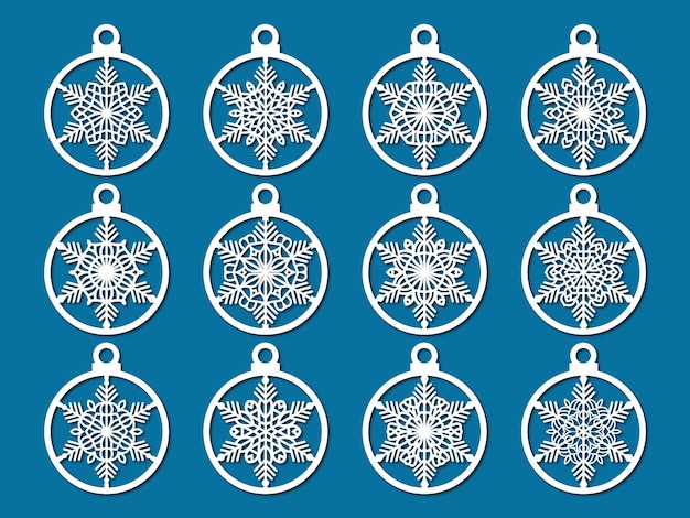 Set of laser cut christmas balls with snowflake cutout of paper sample template for christmas card