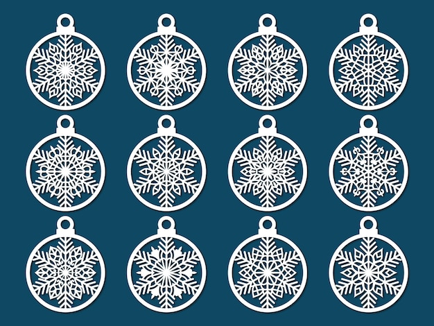 Set of laser cut christmas balls with snowflake cutout of paper sample template for christmas