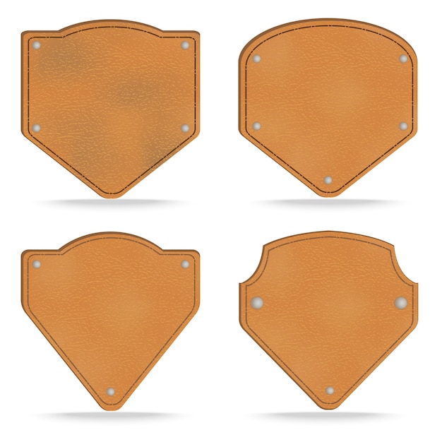 Set of leather tag labels on white