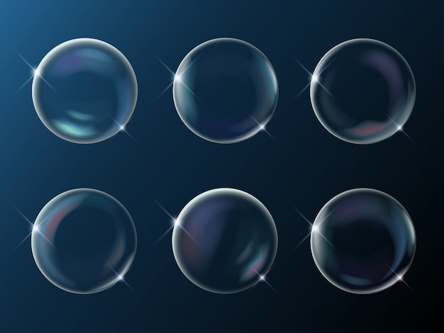 Набор реалистичных ярких игристых мыльных пузырей с отражением радуги на темном
