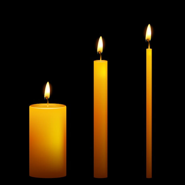 Вектор Набор из трех свечей на темном фоне.
