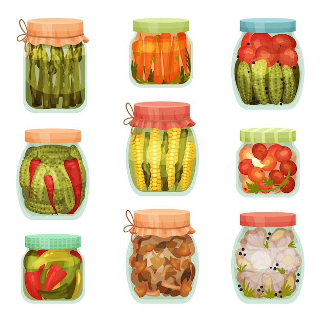 Set of pickles in jars isolated on white