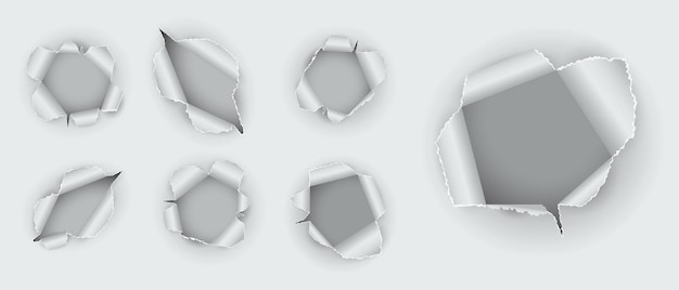 set of realistic hole torn in the paper isolated or various holes torn in ripped white paper or hole