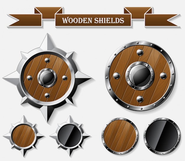 Set of realistic wooden shields isolated on grey