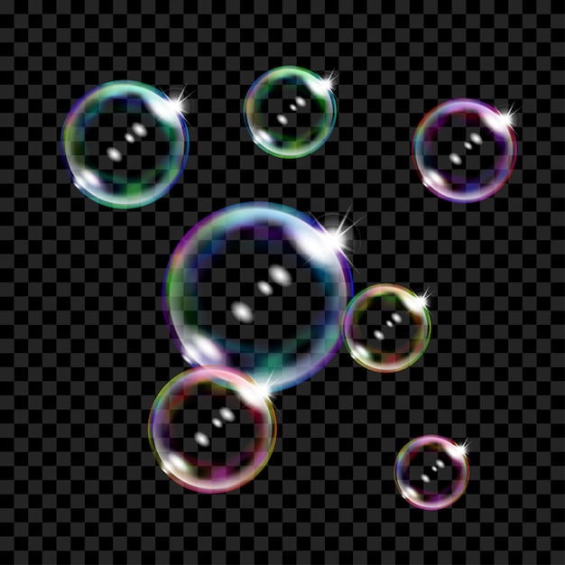 Set of several translucent colored soap bubbles on transparent