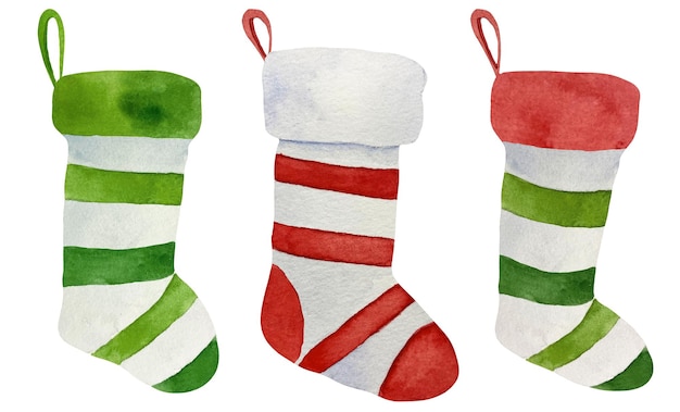 Set traditionele kerst gestreepte kousen in aquarel rood, groen en witte sokken