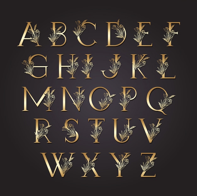 Vector set van gouden letters met bladeren