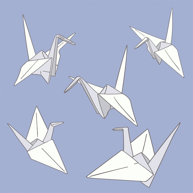 Set van hand getrokken papieren origami vogels op de blauwe