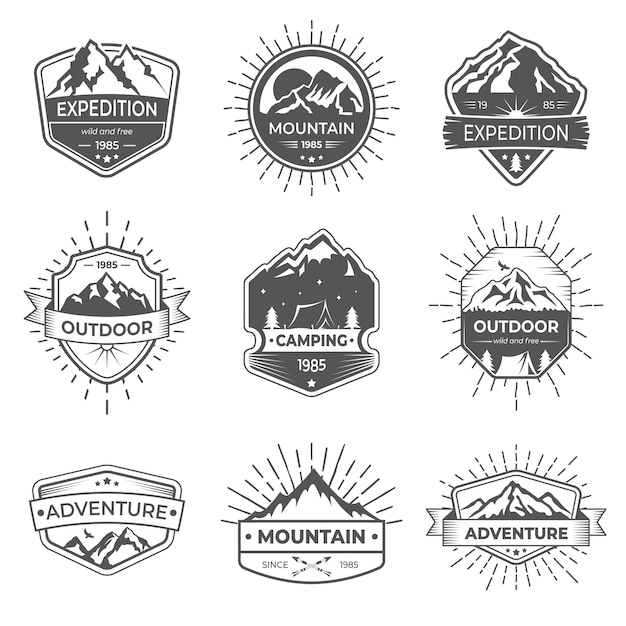 Set van negen vector berg en outdoor avonturen logo.