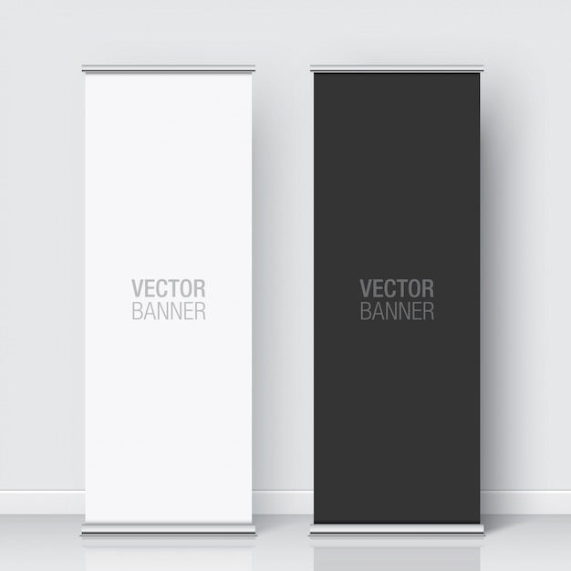 Set van zwart-wit updatebanners permanent op een witte muur achtergrond. Verticale banner realistisch.