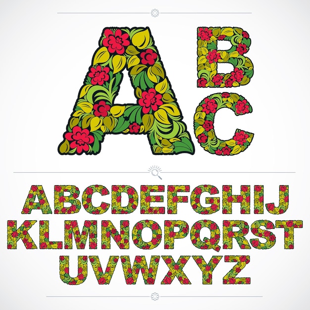 Set vector sierlijke hoofdletters, typoscript met bloemenpatroon. kleurrijke karakters gemaakt met kruidentextuur.