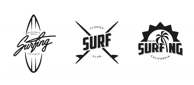 Set of vintage surfing graphics, logos, labels and emblems.