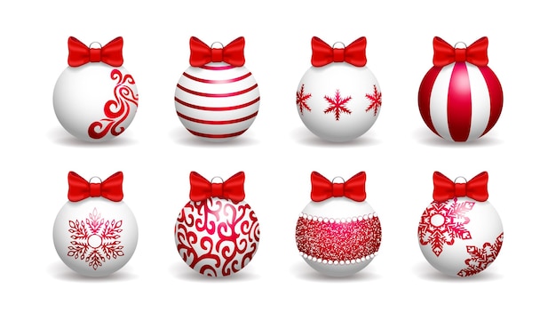 Set di palline di natale bianche decorate con motivi e fiocchi rossi. isolato su sfondo bianco