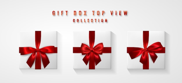 Set of white gift box with red bow and ribbon top view