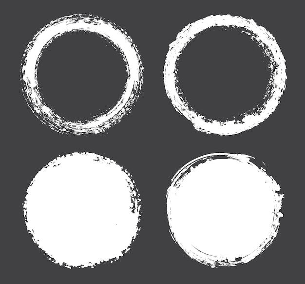 Vector set of white grungy round frames.