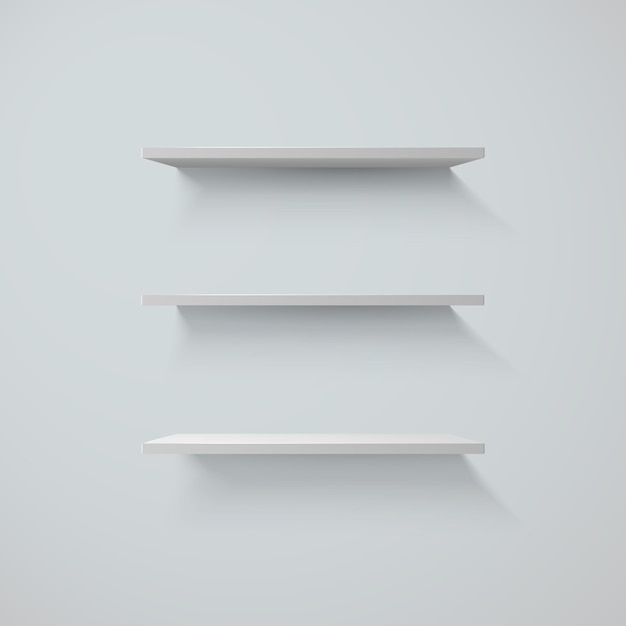 Set of white shelfs on a wall.