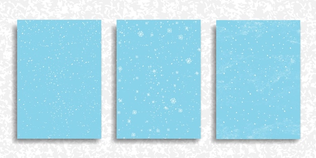 Set of winter snowfall and snowflakes on light blue background. Hand drawn snow pattern. Doodle cold winter sky backgrounds. Vector illustration