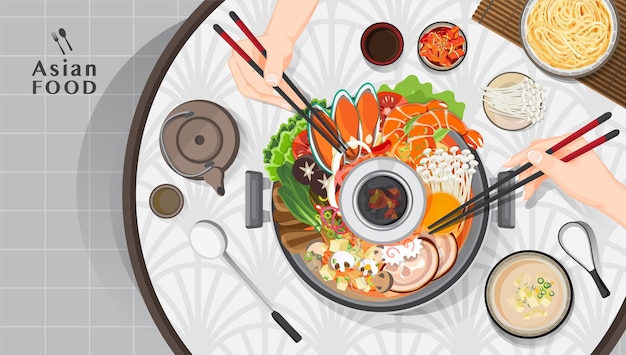 shabu shabu and sukiyaki in hot pot at restaurant,  hand holding chopsticks eating shabu shabu