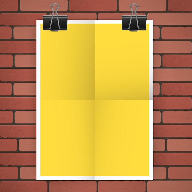 Vector sheet of yellow colour on brick wall