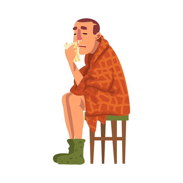 Vector sick man sitting on chair wrapped in plaid guy with flu wearing knitted socks holding handkerchief to his runny nose cartoon vector illustration
