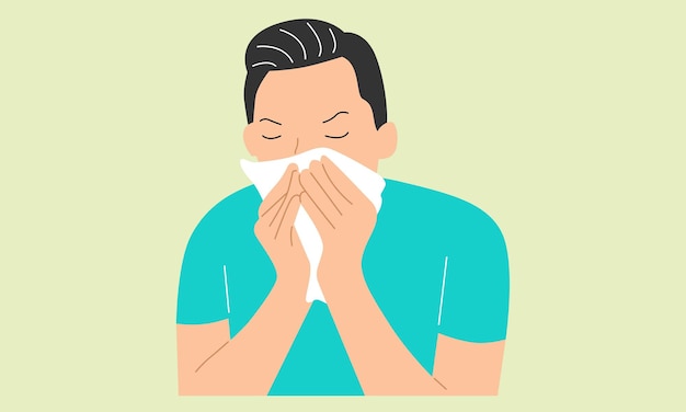 Sick young man holding tissue sneezing into handkerchief blowing running nose