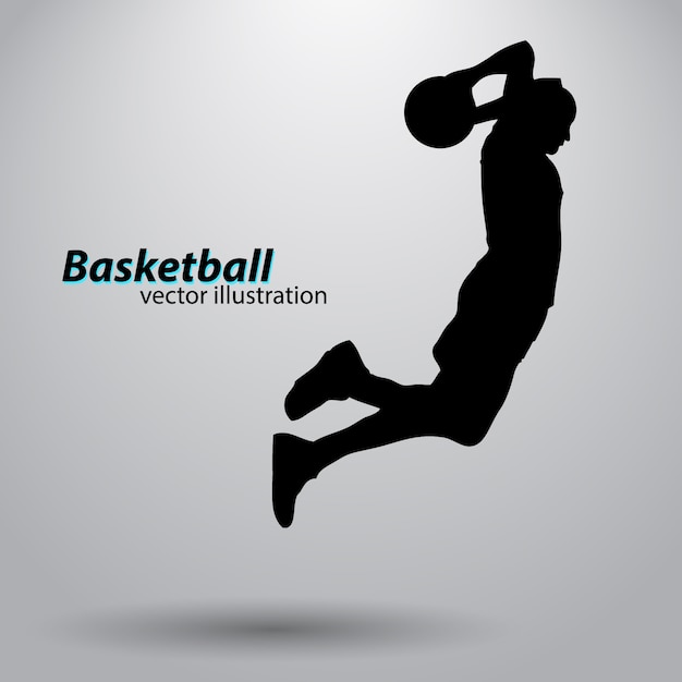 Silhouet van een basketbalspeler.