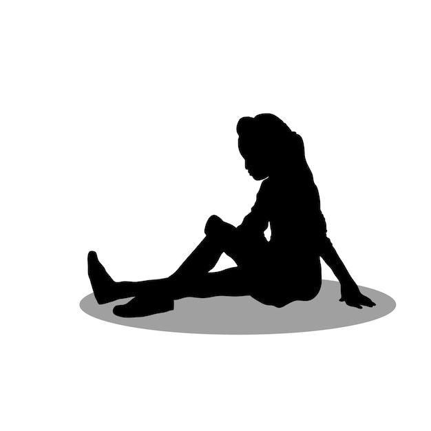 Silhouet van een zittend meisje