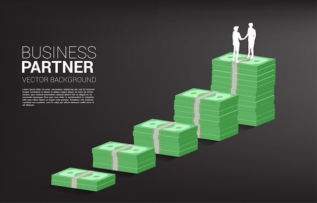 Silhouet van zakenmanhanddruk bovenop bankbiljetgrafiek. concept van zakelijk partnerschap en samenwerking.