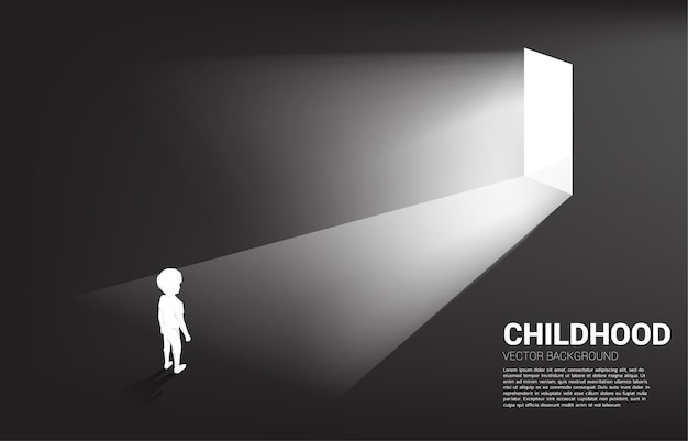 Silhouette of boy standing in front of the way out with light