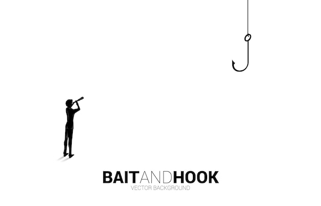 Silhouette of businessman standing looking through telescope with fishing hook. Concept of bait and hook in business.