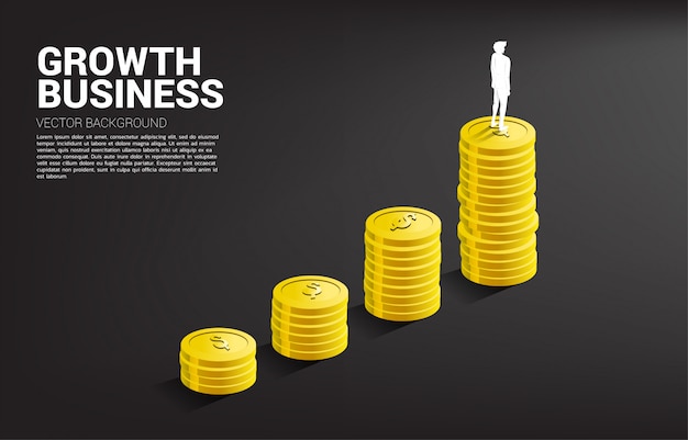 Silhouette of businessman standing on top of growth graph with stack of coin. 