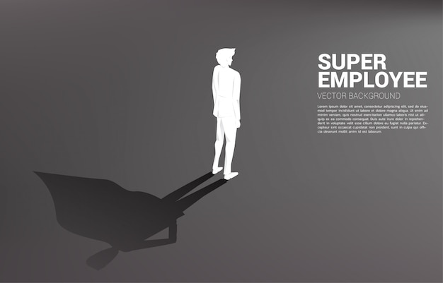 Silhouette of businessman with briefcase and his shadow of superhero
