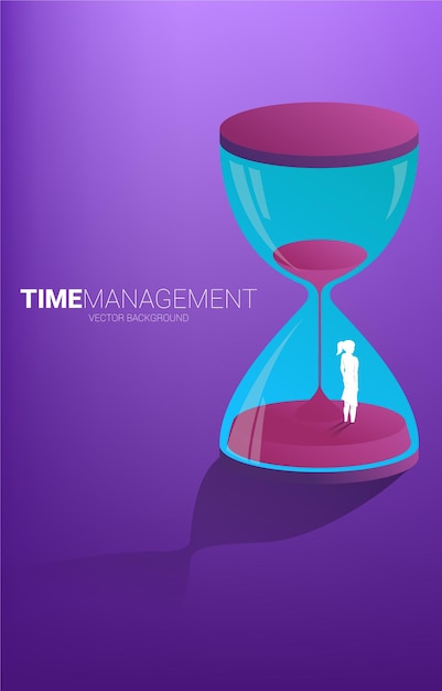 Silhouette of businesswoman standing with clock Concept for office employee and working time