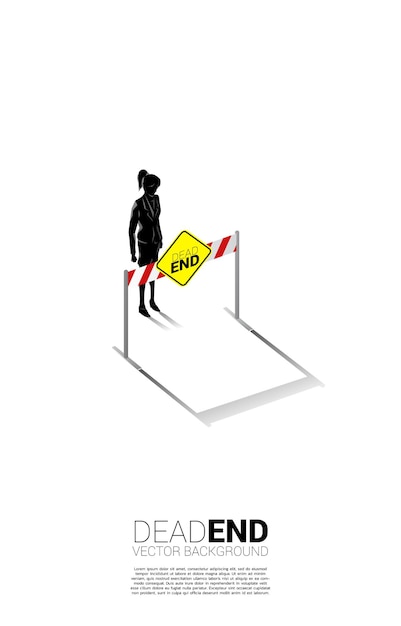 Silhouette businesswoman standing with dead end signage . Concept of wrong decision in business or end of career path.