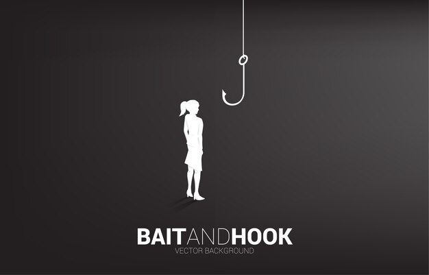 Silhouette of businesswoman standing with fishing hook. Concept of bait and hook in business.