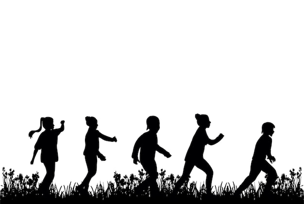 Silhouette of children playing on the grass