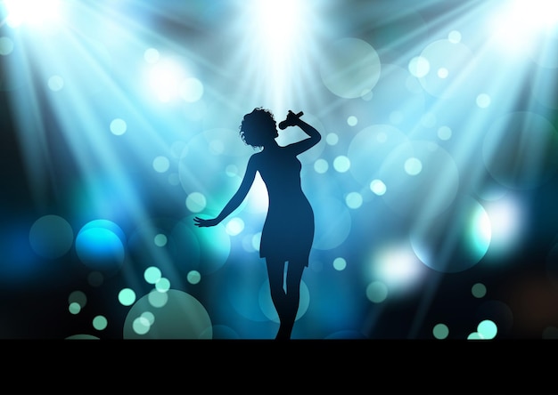 silhouette of a female singer on a stage under spotlights