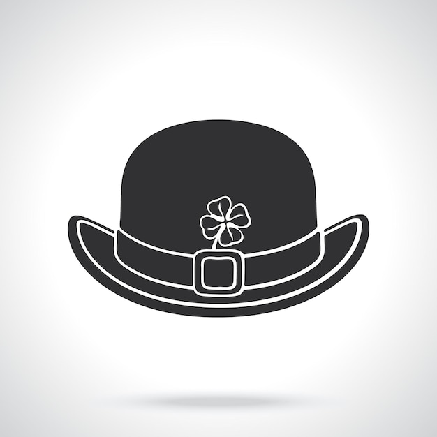 Silhouette of front view of bowler hat with buckle and clover Vector illustration