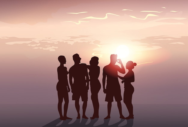 Vector silhouette people group stand man and woman full length over sunset background