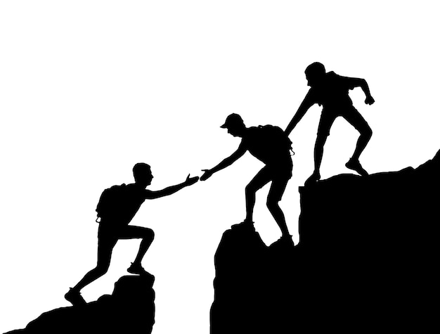 The silhouette of two climbers in the mountains helps another climber overcome an obstacle Business concept of teamwork