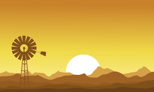 Vector silhouette of windmill at the sunset