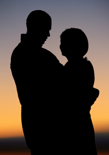 Vector silhouetted couple at sunset