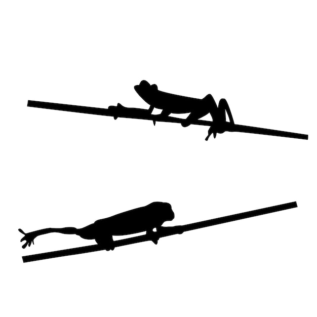 Silhouettes of a lizard on a pole