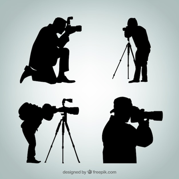 Silhouettes of photographer