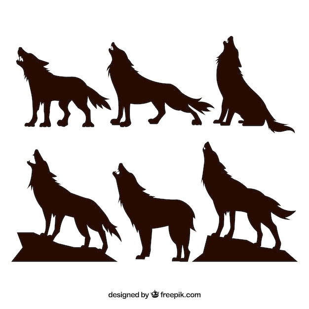 Silhouettes set of wolves howling