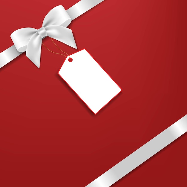 Silver bow with gift tag